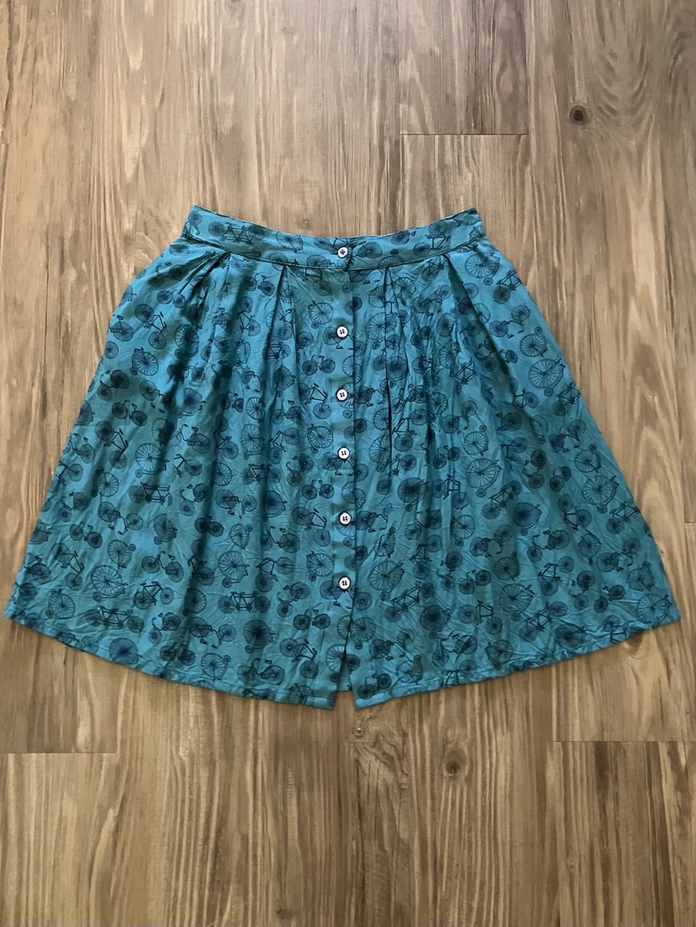 Circus Clothing Ireland teal blue A line pleated skirt bicycle bike print